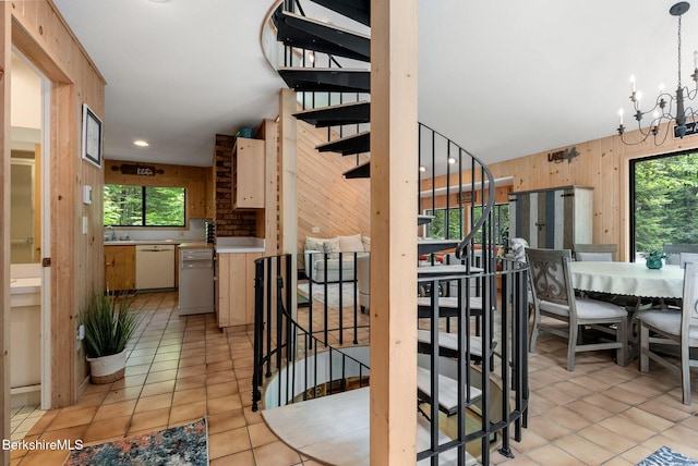454 Seneca Dr, Becket, MA 01223 - stairway with wooden walls, tile patterned flooring, a chandelier, lofted ceiling, and recessed lighting