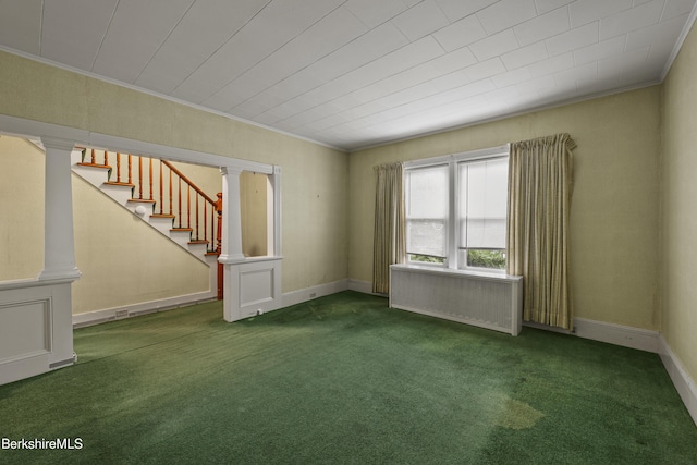 34-36 Crandall St, Adams, MA 01220 - empty room featuring radiator heating unit, carpet, crown molding, and stairway