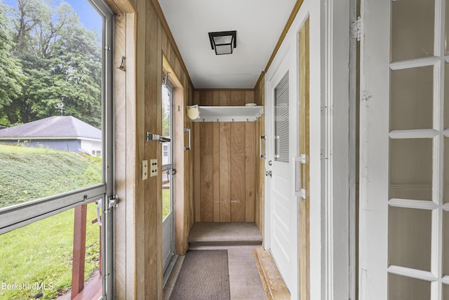 34-36 Crandall St, Adams, MA 01220 - doorway with wood walls and carpet flooring