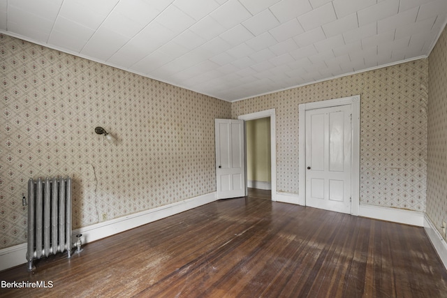 34-36 Crandall St, Adams, MA 01220 - unfurnished bedroom with radiator heating unit, crown molding, hardwood / wood-style flooring, and wallpapered walls