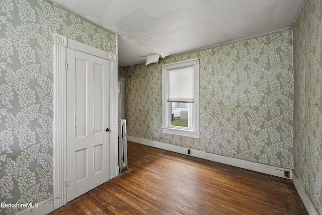 34-36 Crandall St, Adams, MA 01220 - spare room featuring hardwood / wood-style flooring and wallpapered walls