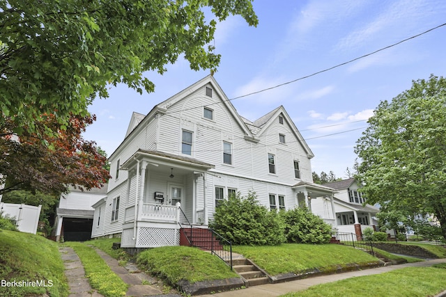 34-36 Crandall St, Adams, MA 01220 - view of front of home featuring covered porch