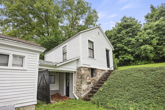34-36 Crandall St, Adams, MA 01220 - view of side of property with a yard and stairway