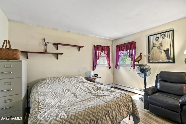 110 Maple Grove Dr, Pittsfield, MA 01201 - bedroom featuring a baseboard radiator and wood finished floors