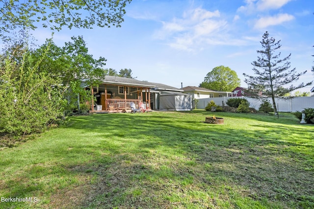 110 Maple Grove Dr, Pittsfield, MA 01201 - view of yard featuring a fire pit and a wooden deck