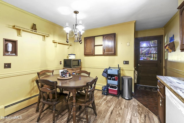 110 Maple Grove Dr, Pittsfield, MA 01201 - dining area featuring a baseboard radiator, a chandelier, light wood finished floors, and crown molding