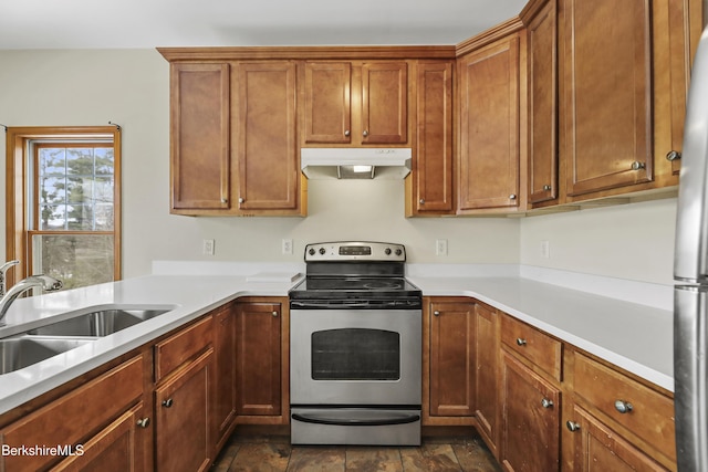 kitchen with appliances with stainless steel finishes and sink