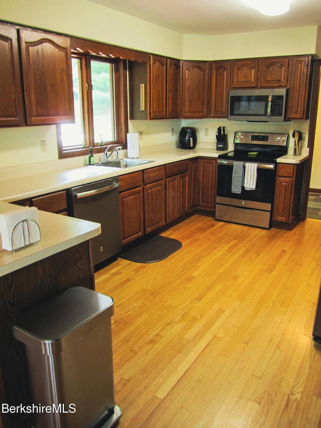 805 Savoy Rd, Cheshire, MA 01225 - kitchen featuring stainless steel appliances, light countertops, and light wood finished floors