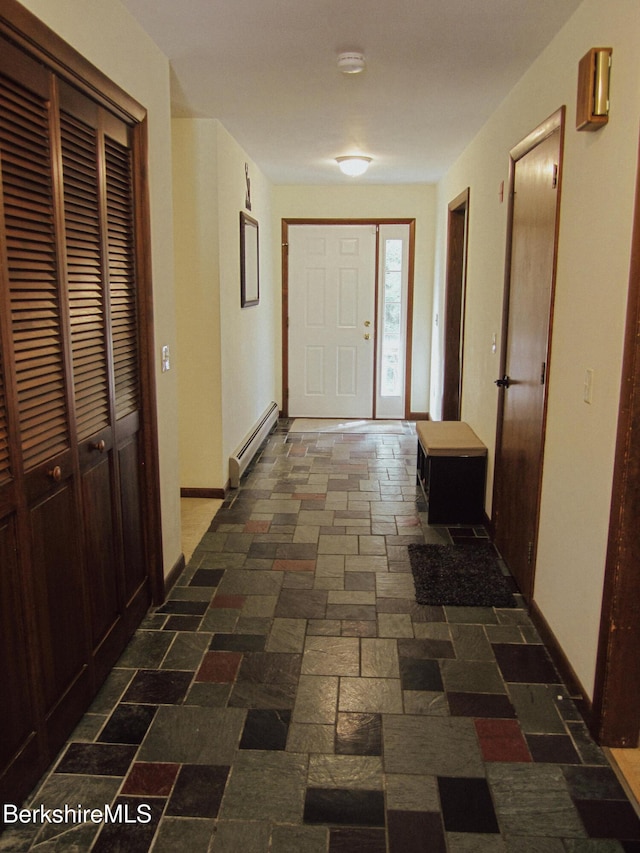805 Savoy Rd, Cheshire, MA 01225 - corridor with a baseboard radiator and stone tile floors