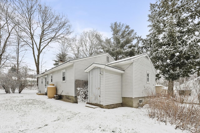 view of snow covered property