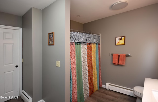 131 Wilshire Dr, Cheshire, MA 01225 - full bathroom featuring toilet, a baseboard radiator, wood finished floors, and a shower with curtain