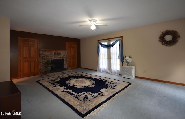 131 Wilshire Dr, Cheshire, MA 01225 - living area featuring light carpet, a brick fireplace, baseboards, and ceiling fan