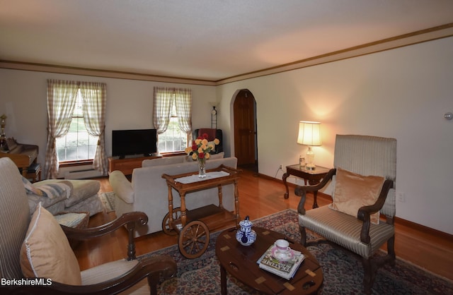 131 Wilshire Dr, Cheshire, MA 01225 - living room featuring arched walkways, baseboards, crown molding, and wood finished floors