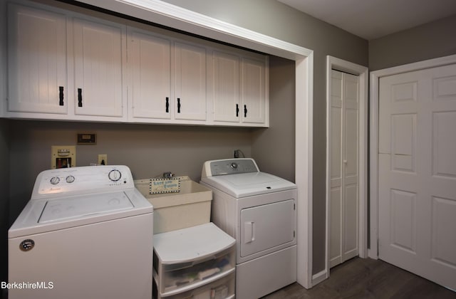 131 Wilshire Dr, Cheshire, MA 01225 - clothes washing area featuring dark wood finished floors, washing machine and dryer, and cabinet space