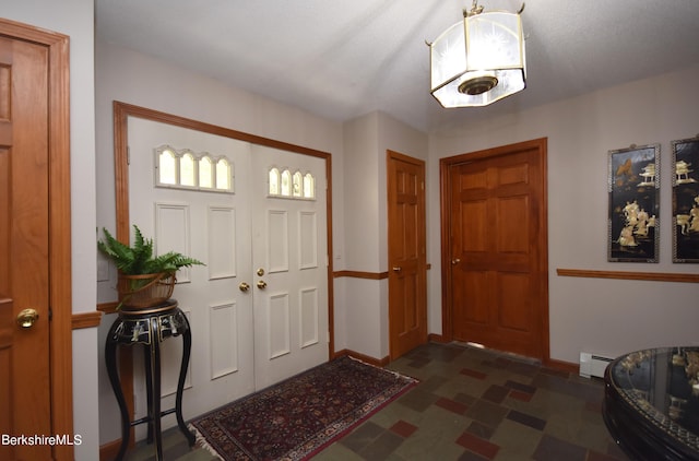 131 Wilshire Dr, Cheshire, MA 01225 - foyer featuring baseboard heating, baseboards, and dark floors