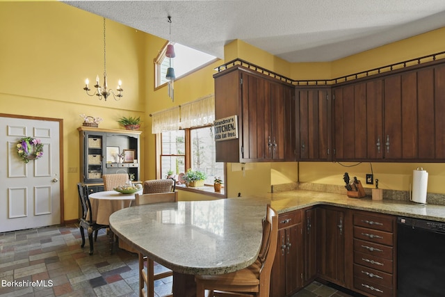 131 Wilshire Dr, Cheshire, MA 01225 - kitchen with stone finish floor, a textured ceiling, an inviting chandelier, and black dishwasher