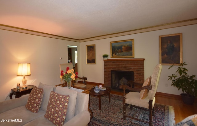 131 Wilshire Dr, Cheshire, MA 01225 - living room featuring crown molding, baseboards, a brick fireplace, and wood finished floors