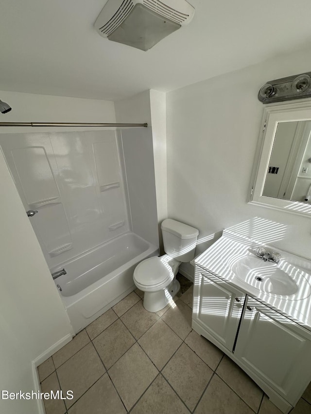 full bathroom with tile patterned floors, vanity, toilet, and shower / bath combination