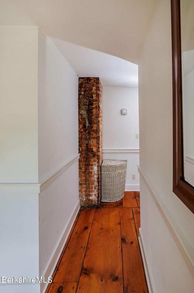 hallway featuring hardwood / wood-style floors