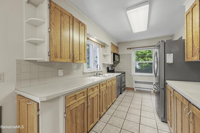 127 Gamwell Ave, Pittsfield, MA 01201 - kitchen with open shelves, appliances with stainless steel finishes, radiator heating unit, and light countertops
