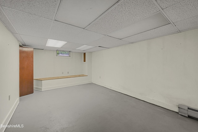 127 Gamwell Ave, Pittsfield, MA 01201 - below grade area with a paneled ceiling and a baseboard radiator