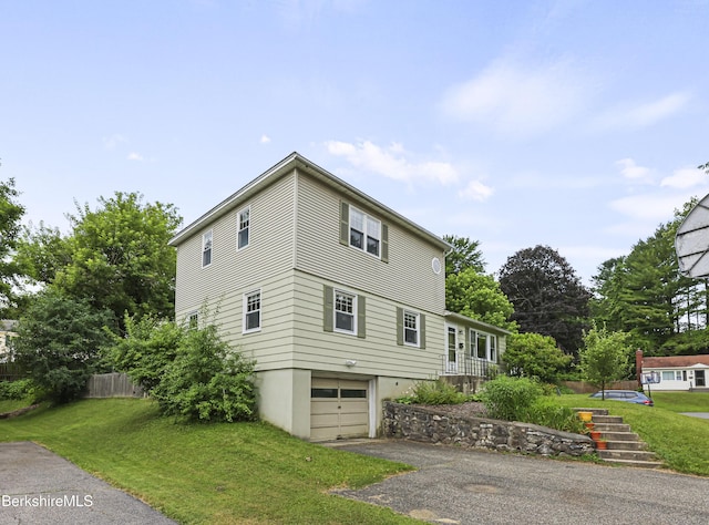 127 Gamwell Ave, Pittsfield, MA 01201 - view of side of home featuring an attached garage and asphalt driveway