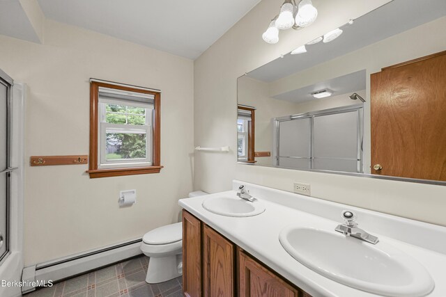 127 Gamwell Ave, Pittsfield, MA 01201 - full bathroom featuring a baseboard heating unit, an enclosed shower, and double vanity