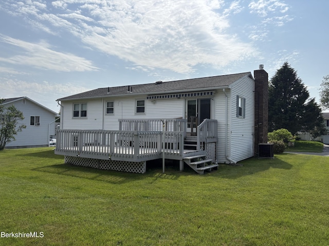 184 Mcintosh Dr, Pittsfield, MA 01201 - back of house featuring a lawn, a chimney, and a wooden deck