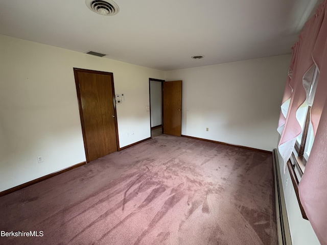 184 Mcintosh Dr, Pittsfield, MA 01201 - unfurnished bedroom featuring carpet floors and baseboard heating
