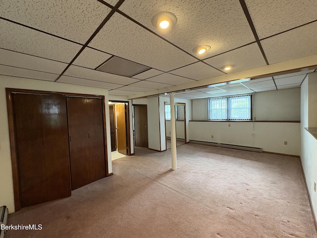 184 Mcintosh Dr, Pittsfield, MA 01201 - below grade area with baseboard heating, light carpet, and a drop ceiling