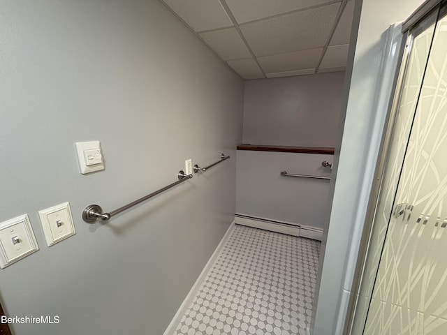 184 Mcintosh Dr, Pittsfield, MA 01201 - bathroom with baseboard heating, a drop ceiling, and tile patterned floors