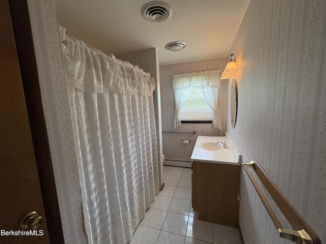 184 Mcintosh Dr, Pittsfield, MA 01201 - bathroom featuring a baseboard radiator, wallpapered walls, vanity, tile patterned floors, and a shower with shower curtain