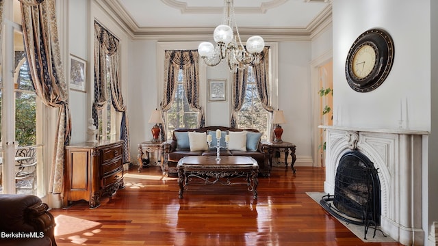 6 Eileen Dr, Rensselaer, NY 12144 - sitting room with a wealth of natural light, an inviting chandelier, and crown molding