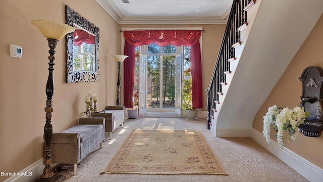 6 Eileen Dr, Rensselaer, NY 12144 - carpeted foyer entrance featuring stairs, crown molding, visible vents, and baseboards