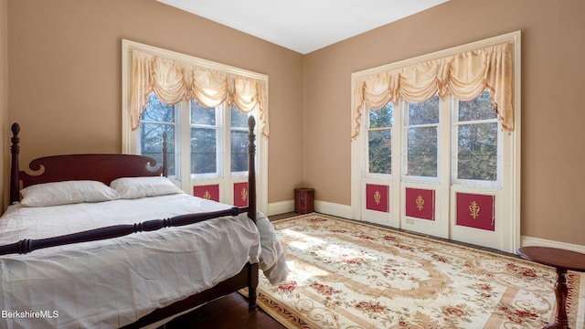 6 Eileen Dr, Rensselaer, NY 12144 - bedroom featuring baseboards and wood finished floors