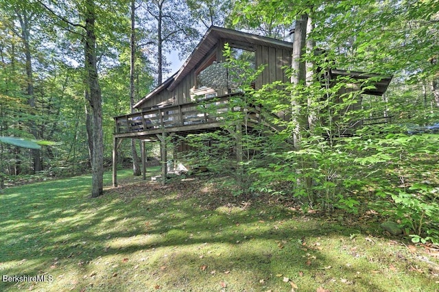 view of yard featuring a wooden deck