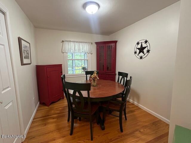 62 Maple Grove Dr, Pittsfield, MA 01201 - dining area featuring light wood-style floors and baseboards