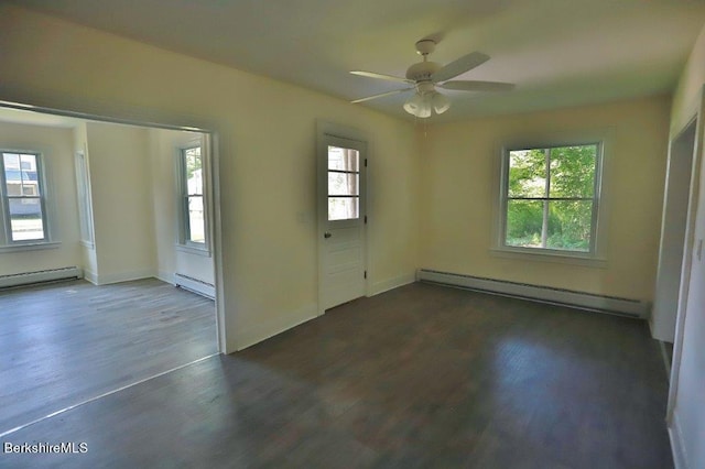 spare room with ceiling fan, dark hardwood / wood-style flooring, and a baseboard radiator