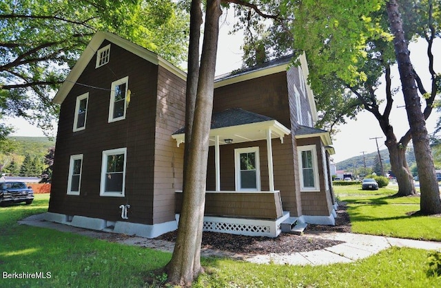 exterior space with a front yard