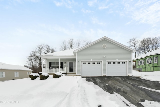 ranch-style house with a porch and a garage