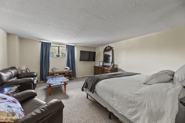 carpeted bedroom featuring a textured ceiling