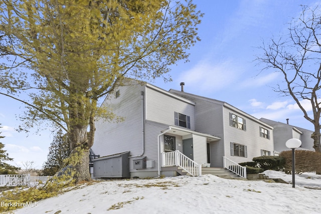 view of front of house with fence