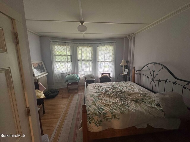 79 Chestnut St, North Adams, MA 01247 - bedroom with baseboards, crown molding, and wood finished floors