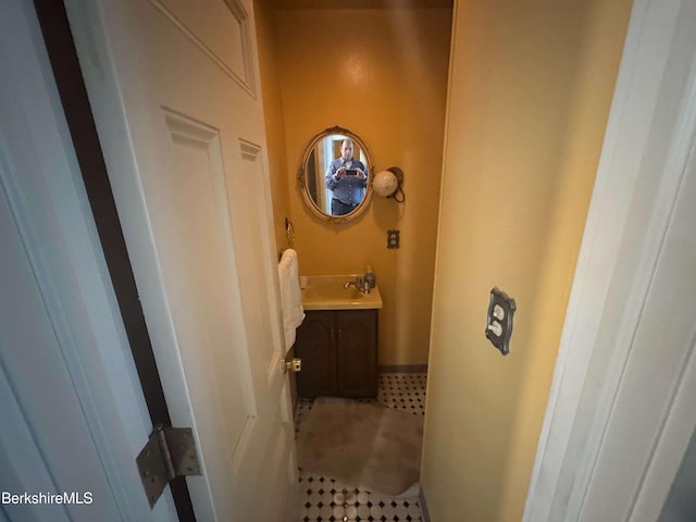 79 Chestnut St, North Adams, MA 01247 - bathroom with tile patterned floors and vanity