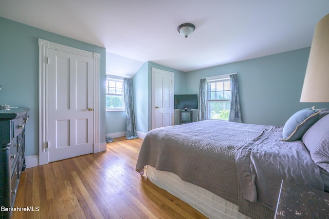 955 Barker Rd, Pittsfield, MA 01201 - bedroom with wood finished floors, baseboards, and lofted ceiling