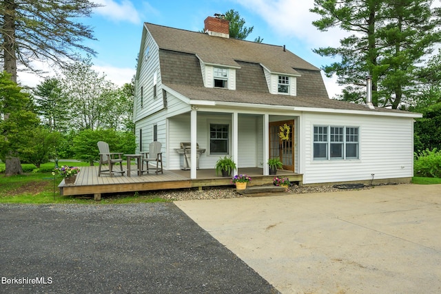955 Barker Rd, Pittsfield, MA 01201 - dutch colonial featuring a shingled roof, a chimney, a gambrel roof, and a porch