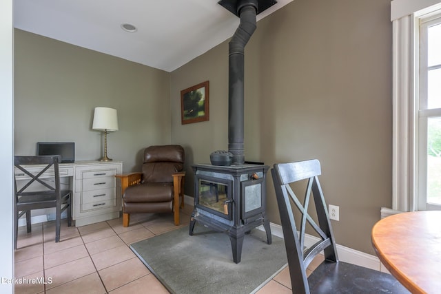 955 Barker Rd, Pittsfield, MA 01201 - living room featuring a wood stove, tile patterned floors, baseboards, and a desk