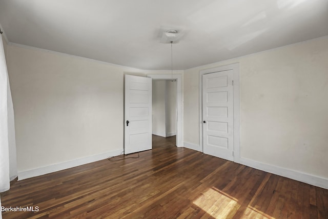 20 Summer St, Lee, MA 01238 - empty room featuring baseboards, dark wood-type flooring, and crown molding
