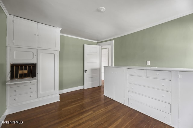 20 Summer St, Lee, MA 01238 - unfurnished bedroom with baseboards, dark wood-style floors, and ornamental molding