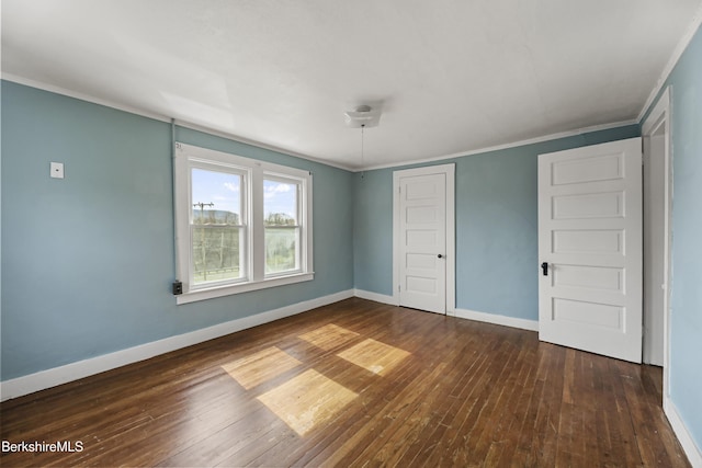 20 Summer St, Lee, MA 01238 - unfurnished bedroom featuring hardwood / wood-style flooring, baseboards, ornamental molding, and a closet
